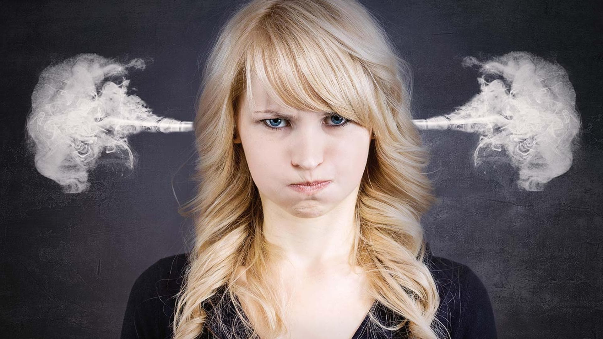 Frau im Stress: Diese Dinge bringen unseren Kopf zum Rauchen