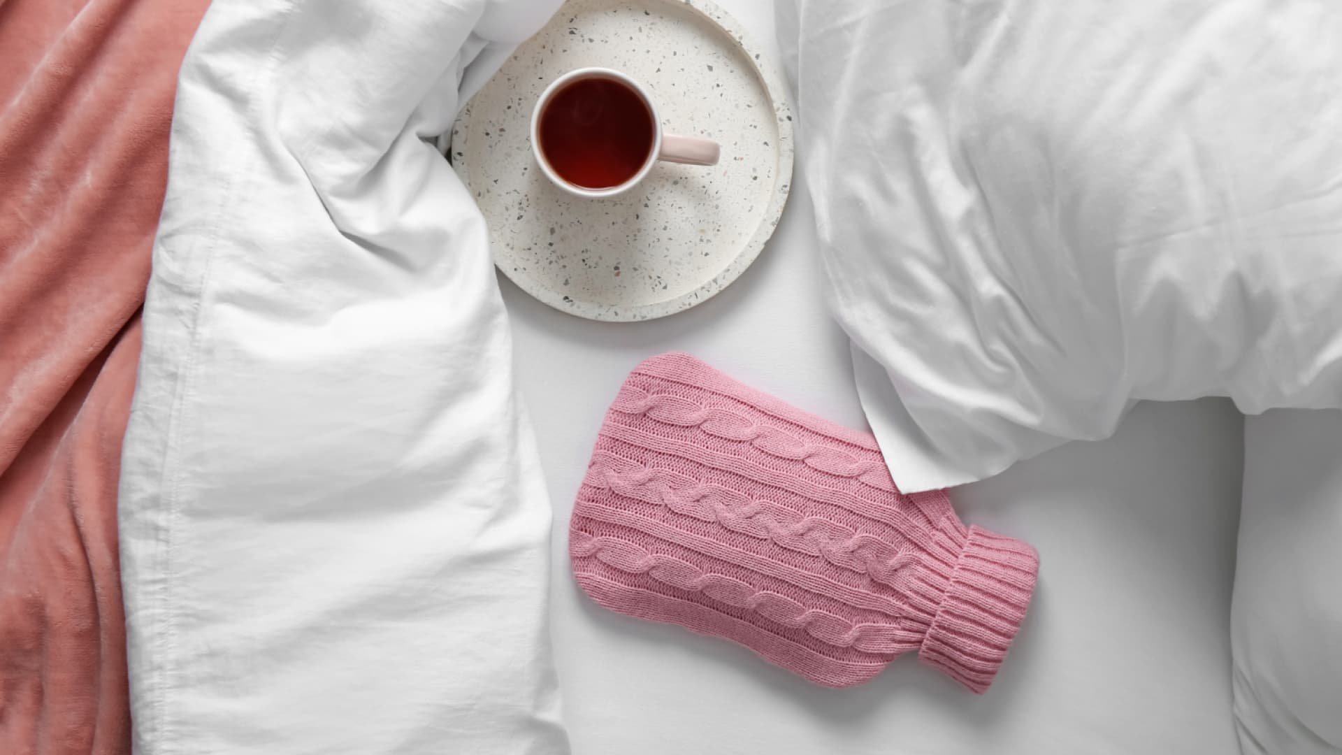 Wärmflasche mit gestrickten Bezug