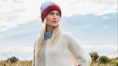 Model in Alpaca Lungo Pullover von Lana Grossa