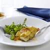 Rezept mit Curryjoghurt gratinierter Zander an Spinatsalat und Macadamianüssen
