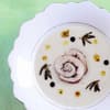 Polentasuppe mit Perlhuhn-Roulade