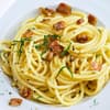 Spaghetti alla Carbonara mit Pancetta und Pecorino - Das Rezept der Sterneköchin Cornelia Poletto finden Sie bei uns