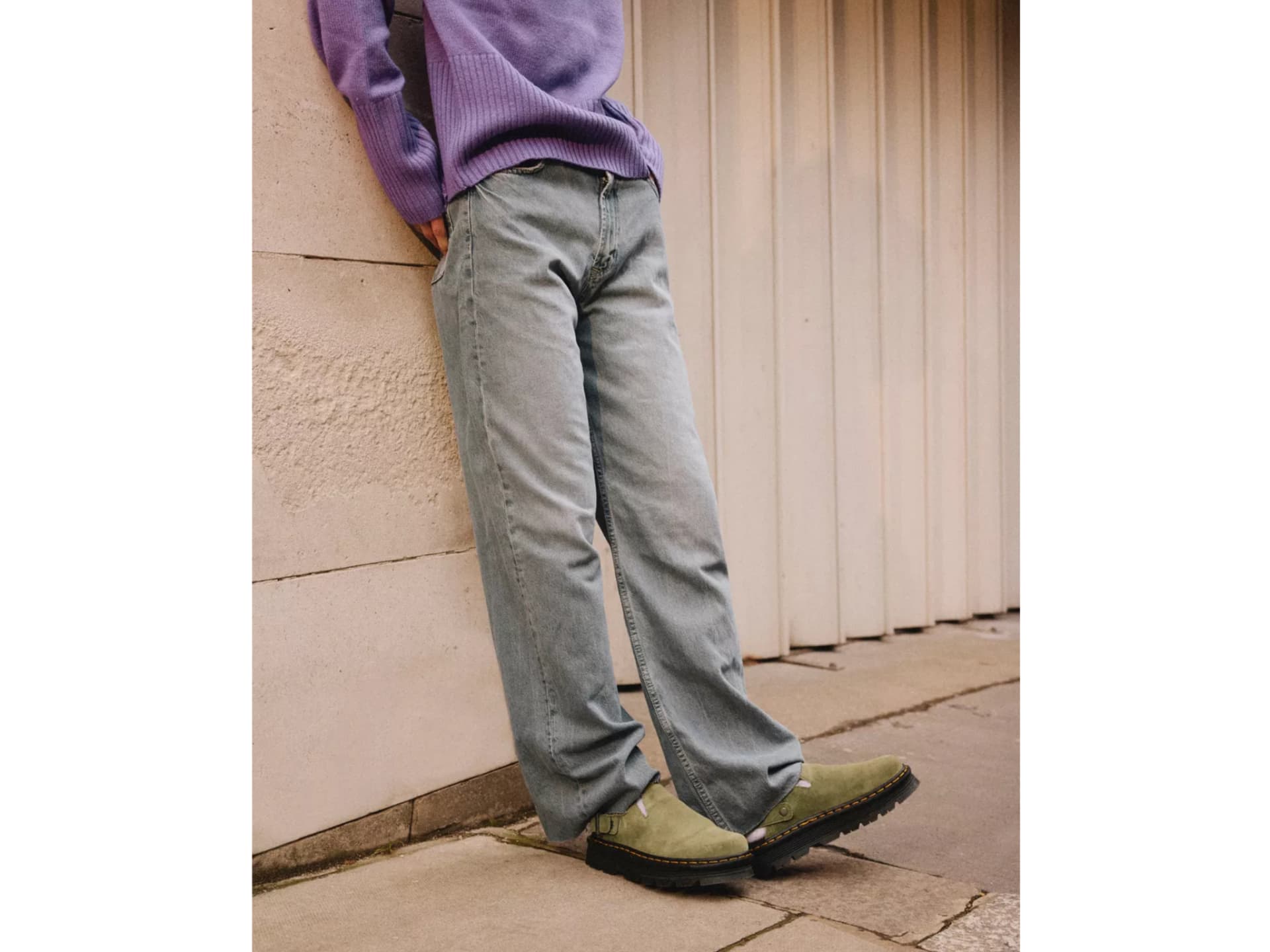 Model in Dr. Martens Zebzag Mules