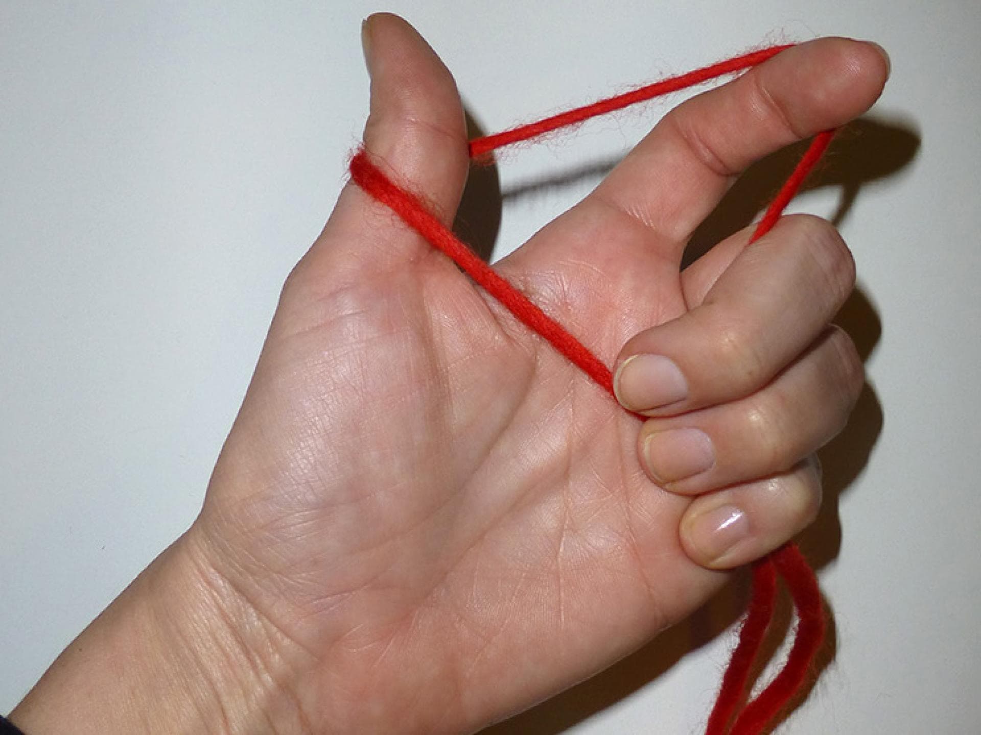 Maschen aufnehmen beim Stricken - 3. Schritt Maschen aufnehmen beim Stricken - Schritt 3