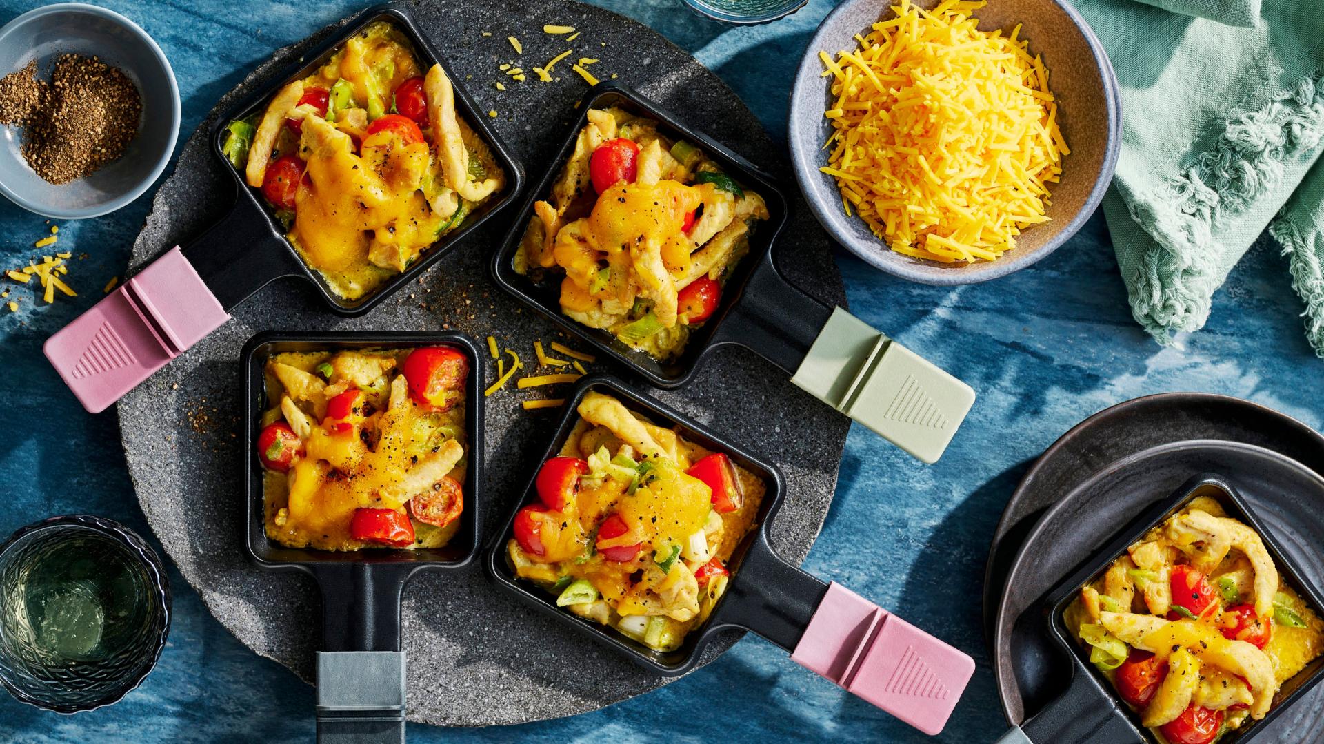 Curry-Hähnchen-Raclette mit Tomaten